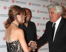 LOS ANGELES  OCT 23  Tracey Bregman JR Martinez Jay Leno at the American Friends of Magen David Adoms Red Star Ball at Beverly Hilton Hotel on October 23 2014 in Beverly Hills CA photo