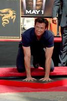 Hugh Jackman  at the Hugh Jackman Handprint  Footprint Ceremony at Graumans Chinese Theater Forecourt in Los Angeles  California on April 21 20092009 photo