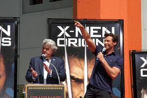 Jay Leno  Hugh Jackman  at the Hugh Jackman Handprint  Footprint Ceremony at Graumans Chinese Theater Forecourt in Los Angeles  California on April 21 20092009 photo