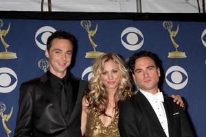 Jim Parsons Kaley Cuoco  Johnny GaleckiIn the Press Room  at the 2009 Primetime Emmy AwardsNokia Theater at LA LiveLos Angeles CASeptember 20 20092009 photo