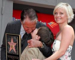 George Hamilton  son GT with girlfriend Barbara Strum at the Hollywood Walk of Fame ceremony bestowing a Star in his honor  in Hollywood CA  on August 12  2009 2009 photo