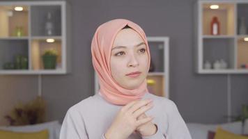 The headscarves woman is excited. The headscarves woman is very excited. video