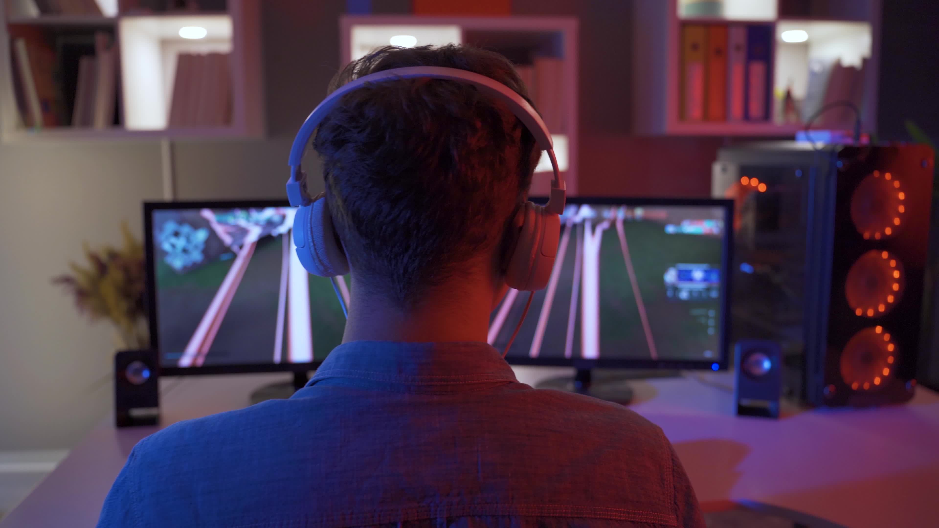 retrato do uma homem jogando uma jogos dentro uma Sombrio sala. celebridade  sentado baixa dentro uma brilhantemente aceso, confortável videogames  gabinete, ai gerado 29131472 Foto de stock no Vecteezy