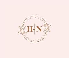 initial HN letters Beautiful floral feminine editable premade monoline logo suitable for spa salon skin hair beauty boutique and cosmetic company. vector