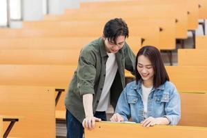 Young Asian couple in the classroom photo