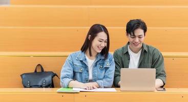Young Asian couple in the classroom photo