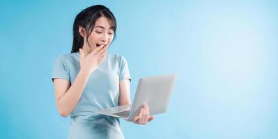 Asian woman on blue background photo