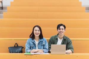 Young Asian couple in the classroom photo