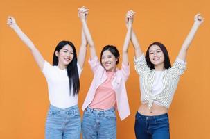 Image of young three Asian girl on background photo