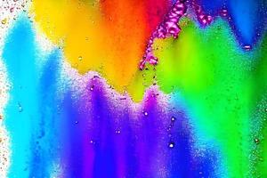 Abstract streaks of rainbow paint explosion ink pattern texture art paper photo