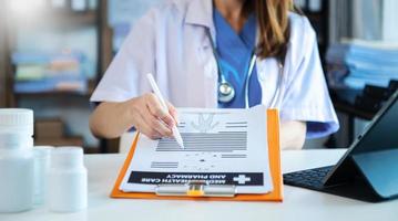 Medicine doctor hand working with modern digital tablet computer interface as medical network concept in photo