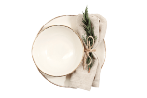 Beige plate, bowl and napkin isolated on a transparent background png