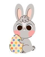 bunny with easter egg vector
