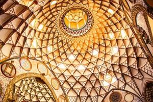 Kashan, Iran - 29th june, 2022 - Amazing view of hot bathing hall garmkhaneh at Sultan Amir Ahmad Bathhouse. Persian public bathhouse. Kashan is a popular tourist destination of the Middle East. photo