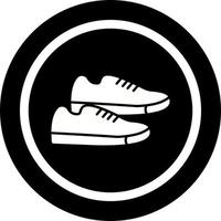 icono de vector de zapatillas