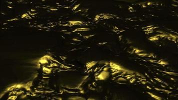 suavemente ondulación líquido oro o oscuro agua con dorado ligero reflexiones bucle, lleno hd movimiento antecedentes animación. video