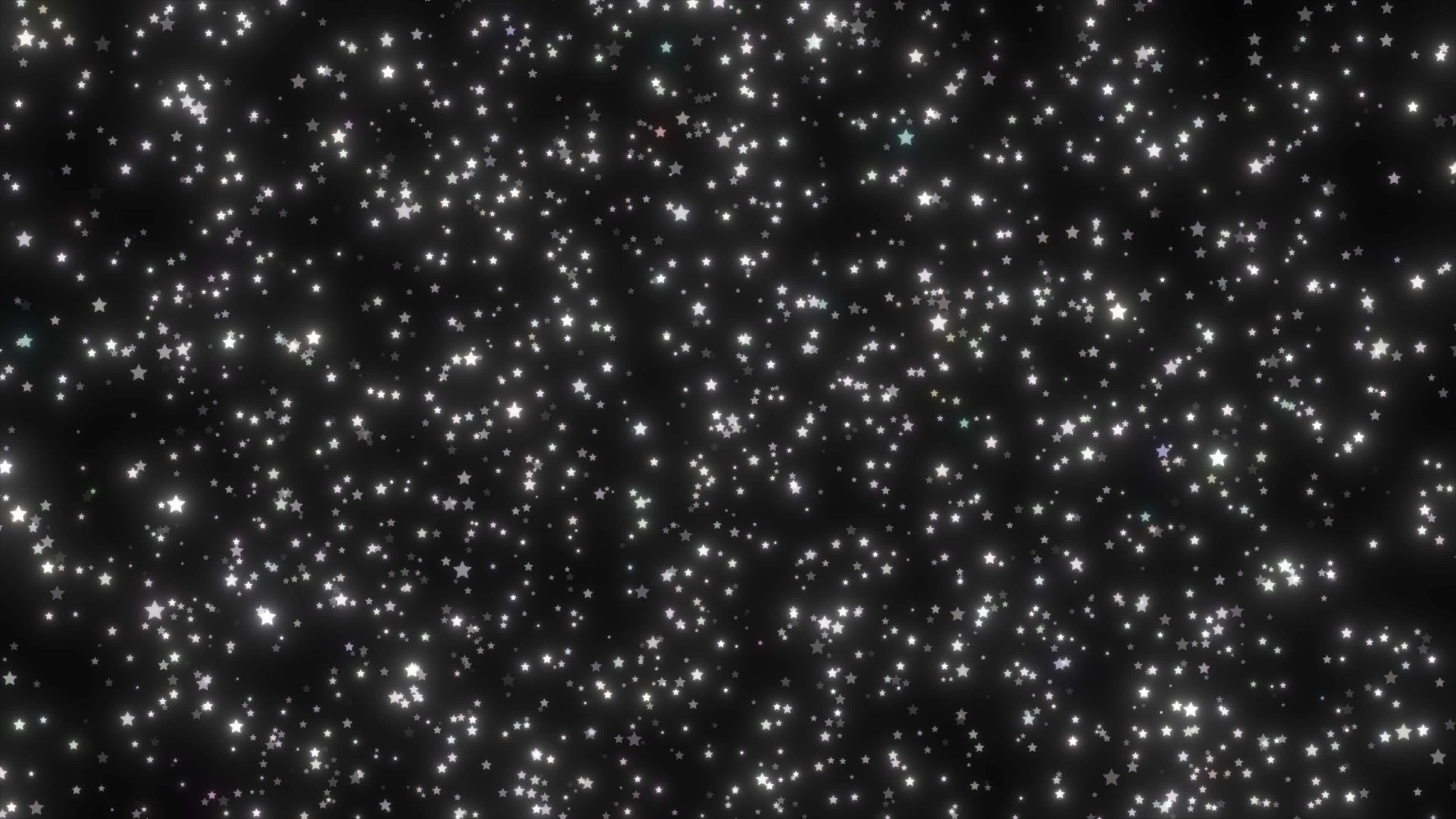 Những ngôi sao trắng lấp lánh rơi trên nền đen sẽ khiến bạn cảm thấy như đang trôi dạt trong vũ trụ bao la. Sự long lanh của những ngôi sao sẽ giúp bạn thư giãn và không gian đen tối sẽ tạo ra một cảm giác bình yên và lạ lẫm. Hãy xem những ngôi sao này rơi lần lượt để trải nghiệm những điều kỳ diệu. 