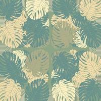 Seamless pattern with tropical leaves on a green background vector