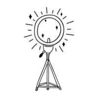 Studio ring lamp vector icon. Round led on a tripod. Gadget for selfie, streaming, blogging, beauty. Black outline, simple doodle, line art. Illustration isolated on white. Clipart for logo, apps, web