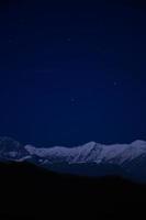 Winter mountain nightsky photo