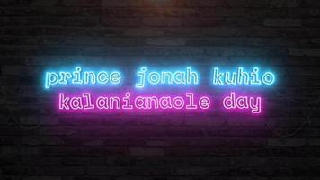 Prince jonah kuhio kalanianaole day with neon text animation effect in wall background. Seamless loop video