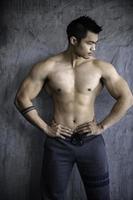 Portrait of asian man big muscle at the gym,Thailand people,Workout for good healthy,Body weight training,Fitness at the gym concept photo