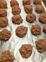 Tasty sausage cheese balls  on a tray photo