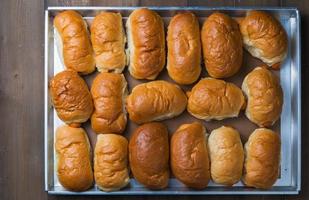 sausage bread on wood background photo