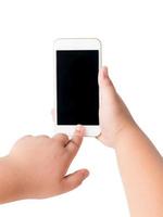 kid hand touch on mobile smart phone with blank screen. photo