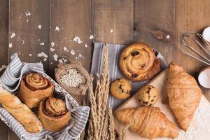 Homemade breads or bun on wood background photo