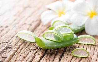 Aloe Vera sliced on wood photo