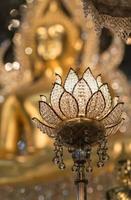 lotus lamp and Buddha statue background photo