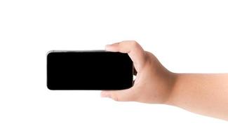Mobile phone in boy hand isolated photo