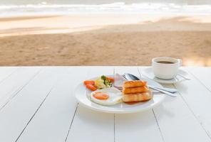 breakfast set on white table. photo
