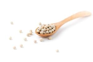 white pepper seed on spoon photo