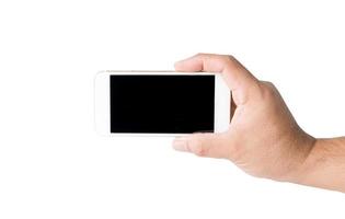 Hand holding mobile smart phone with blank screen. photo