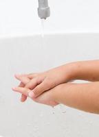 washing kid hands photo