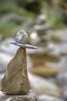 Beauty balancing pebbles from river stones stack. Tranquil Concept photo