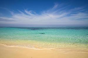 A man with snorkel mask tuba and snorkel in the sea. Snorkeling in Guardalavaca, Cuba photo