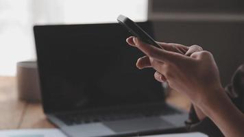 Financial analysts analyze business financial reports on a digital tablet planning investment project during a discussion at a meeting of corporate showing the results of their successful teamwork. video