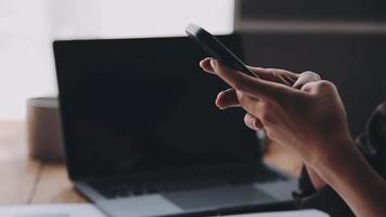 Financial analysts analyze business financial reports on a digital tablet planning investment project during a discussion at a meeting of corporate showing the results of their successful teamwork. video