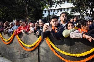 nueva delhi, india - 16 de enero de 2023 - miles de personas reunidas durante el primer ministro narendra modi bjp road show, personas durante el gran mitin electoral de pm modi en la capital foto