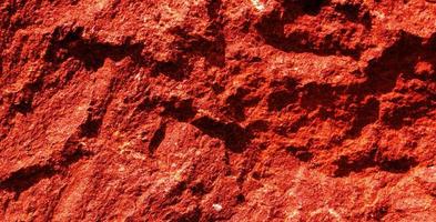 abstract red stone texture in panoramic photo