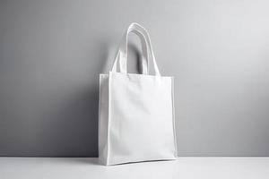 Blank canvas tote bag mockup in white eco friendly design with copy space. Concepts for zero waste movement of shopping bags photo