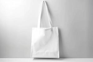 Blank canvas tote bag mockup in white eco friendly design with copy space. Concepts for zero waste movement of shopping bags photo