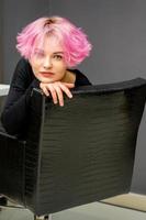 Woman with short pink hairstyle photo