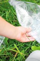 Plastic bag in little hands photo