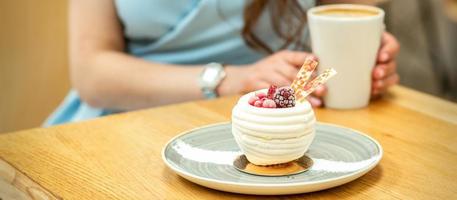 Sweet white cupcake with berries photo