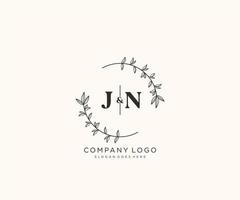 initial JN letters Beautiful floral feminine editable premade monoline logo suitable for spa salon skin hair beauty boutique and cosmetic company. vector