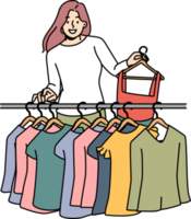 Smiling woman shopping clothes in boutique png